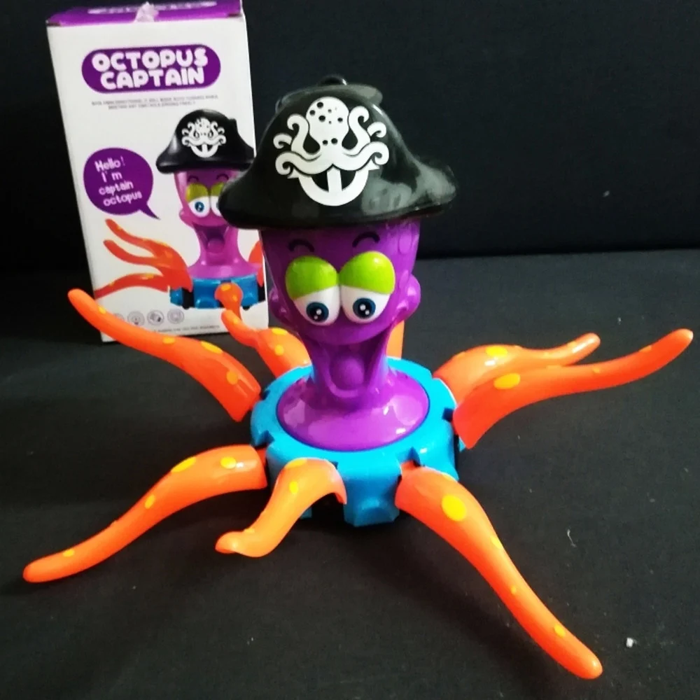 GIOCO CAPITANO POLIPO OCTOPUS LUCI MUSICA SUONI MUOVE TENTACOLI PIRATA BAMBINI - TrAdE Shop Traesio