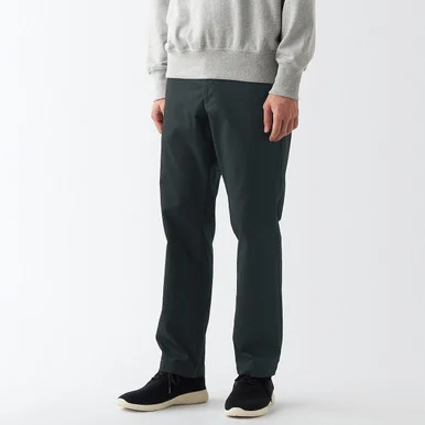 Pantaloni chino a gamba slim elasticizzati Nero - Uomo