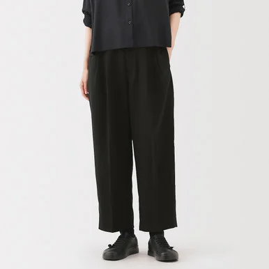 Pantaloni a gamba larga plissettati in twill di poliestere da donna