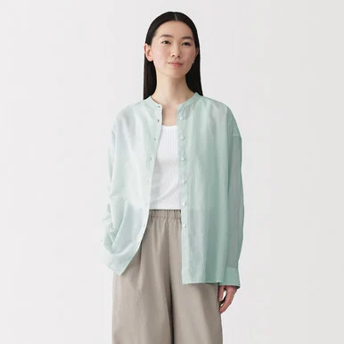 Blusa trasparente a torsione alta in cotone biologico da donna